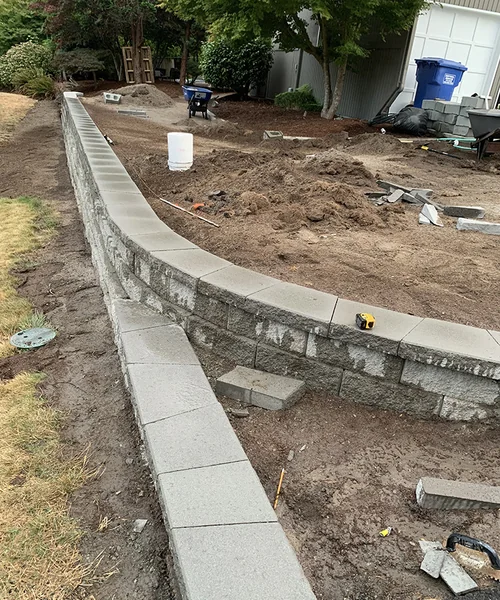 Retaining wall and new grass installation in Federal Way 